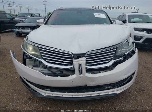 2LMPJ6LR4JBL14856 2018 LINCOLN MKX Белый Вид щитка приборов