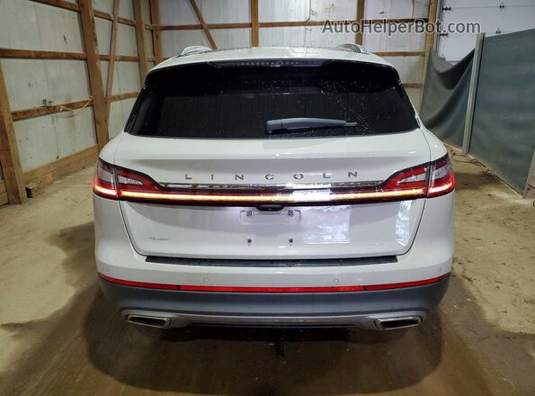 2LMPJ8K92MBL15294 2021 LINCOLN NAUTILUS Beige Rear view