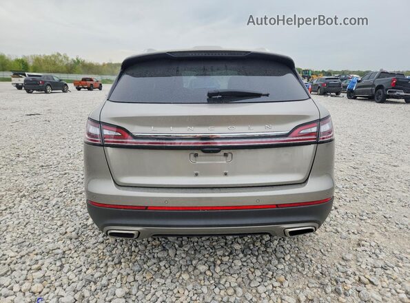 2LMPJ8KP9PBL21029 2023 LINCOLN NAUTILUS Beige Rear view