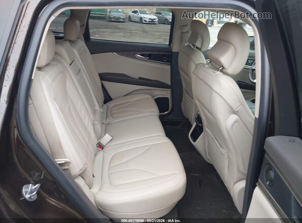 2LMPJ8L91KBL13189 2019 LINCOLN NAUTILUS Brown VIN կոդի պիտակի տեսք