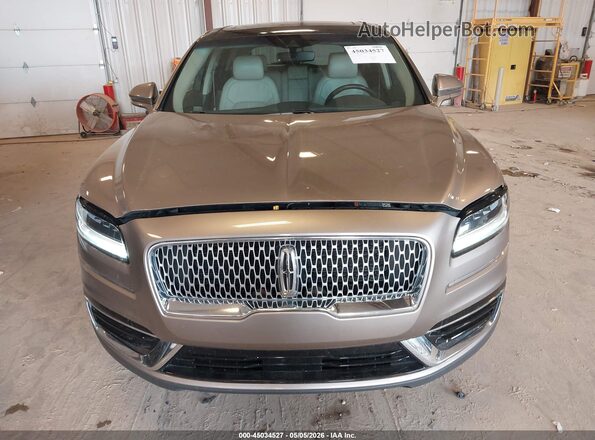 2LMPJ8L94KBL58613 2019 LINCOLN NAUTILUS Tan Вид щитка приладів