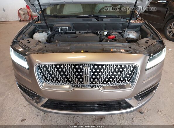 2LMPJ8L94KBL58613 2019 LINCOLN NAUTILUS Tan Вид ззаду