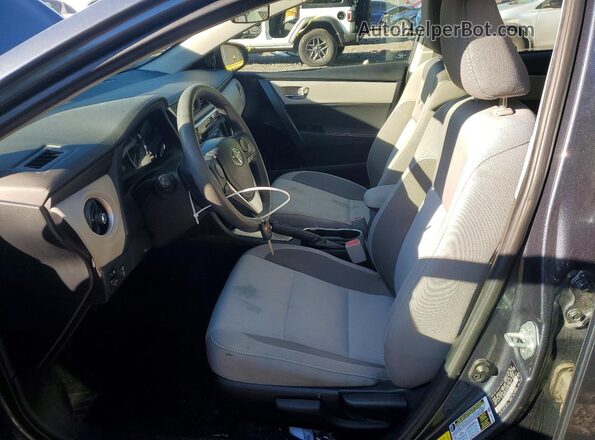 2T1BURHE0KC200192 2019 TOYOTA COROLLA Синий Вид салона спереди
