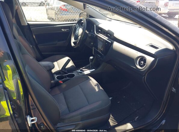 2T1BURHE1HC769321 2017 TOYOTA LL Black Front interior view