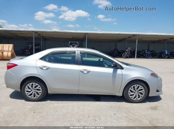2T1BURHE1JC067750 2018 TOYOTA LL Серебряный Вид задней части салона