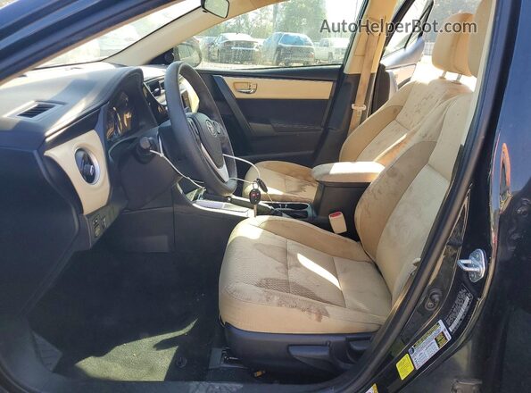 2T1BURHE2HC768596 2017 TOYOTA LL Черный Вид салона спереди