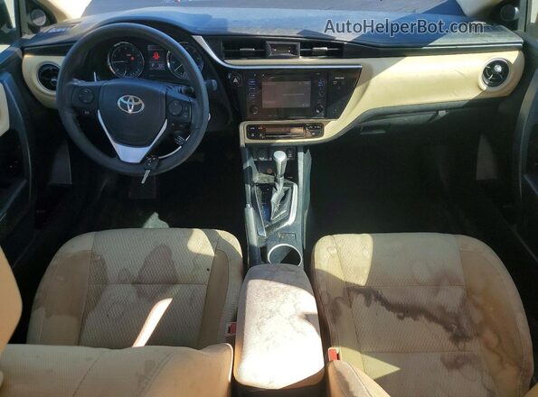 2T1BURHE2HC768596 2017 TOYOTA LL Черный Вид панели приборов