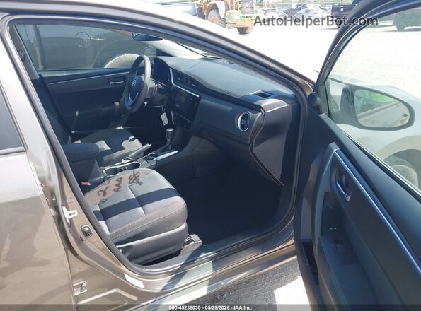2T1BURHE2HC908274 2017 TOYOTA COROLLA Gold Front interior view