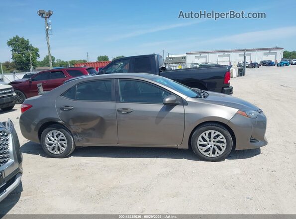 2T1BURHE2HC908274 2017 TOYOTA COROLLA Gold Rear interior view