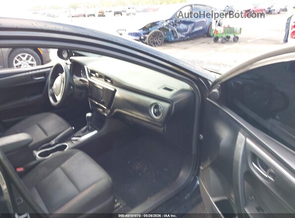 2T1BURHE2KC201263 2019 TOYOTA COROLLA Black Front interior view