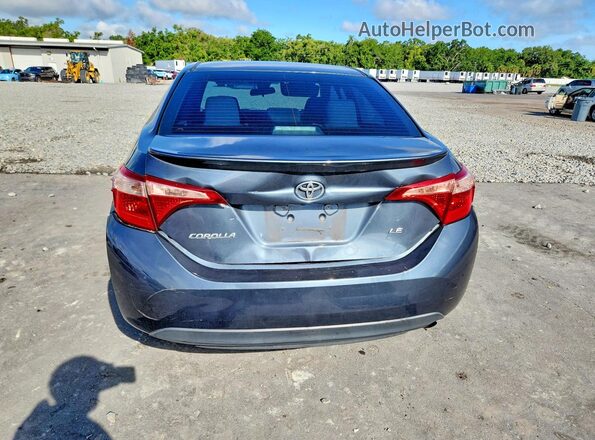 2T1BURHE3HC868013 2017 TOYOTA COROLLA Gray Vista trasera