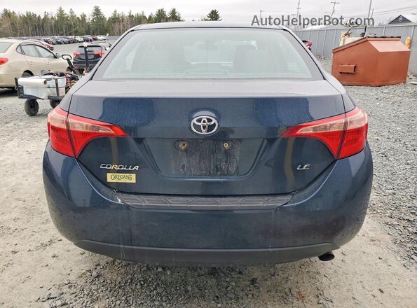 2T1BURHE4JC975979 2018 TOYOTA COROLLA Blue Rear view