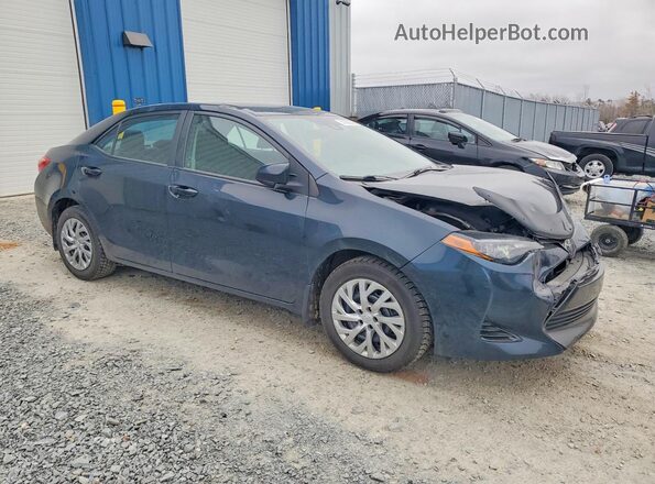 2T1BURHE4JC975979 2018 TOYOTA COROLLA Blue Front right