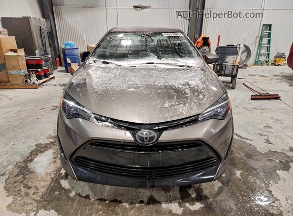 2T1BURHE4JC990854 2018 TOYOTA LL Brown Widok z przodu