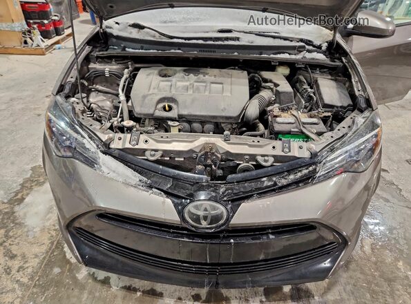 2T1BURHE4JC990854 2018 TOYOTA LL Brown Widok wnętrza z tyłu