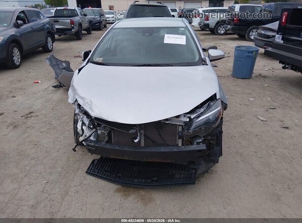 2T1BURHE4JC991129 2018 TOYOTA COROLLA Silver უკანა სალონის ხედი
