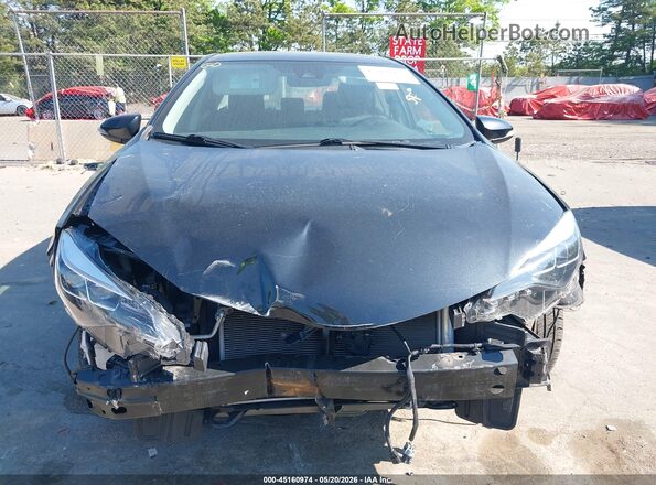 2T1BURHE4KC186328 2019 TOYOTA COROLLA Black Front view