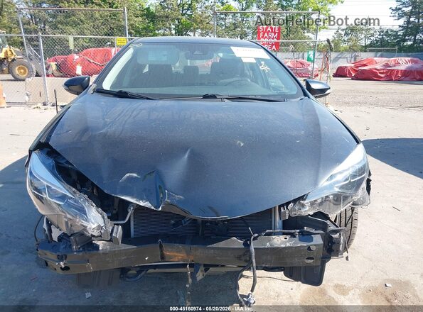 2T1BURHE4KC186328 2019 TOYOTA COROLLA Black Rear interior view