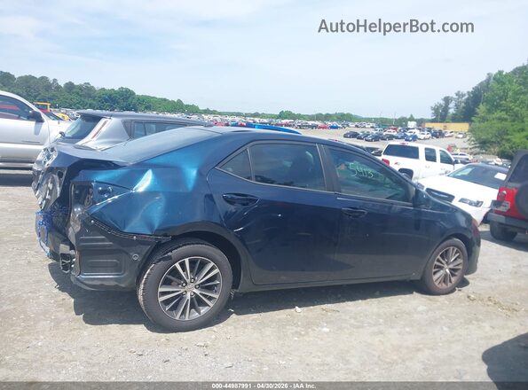 2T1BURHE4KC219456 2019 TOYOTA LL Dark Blue Вид задньої частини салону