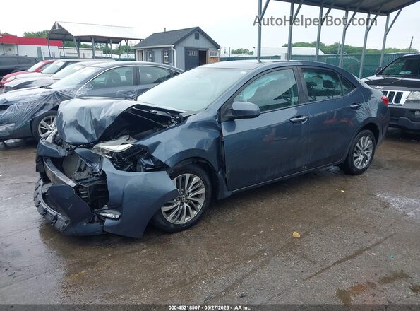 2T1BURHE5HC902856 2017 TOYOTA COROLLA Blue Vista tres cuartos delantera izquierda