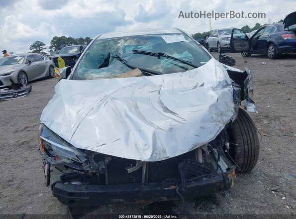 2T1BURHE5KC165956 2019 TOYOTA COROLLA Silver Widok wnętrza z tyłu