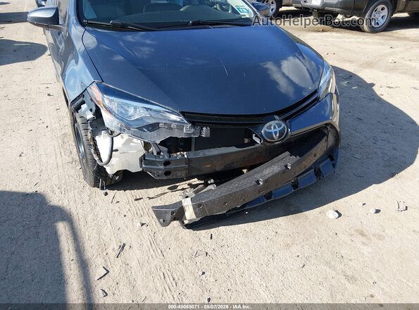 2T1BURHE6HC901313 2017 TOYOTA LL Серый Вид спереди