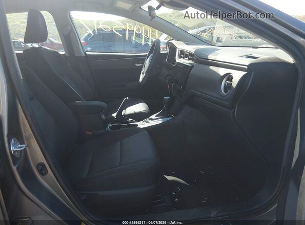 2T1BURHE6JC107370 2018 TOYOTA LL Gold წინა სალონის ხედი
