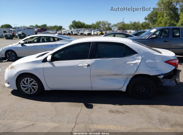 2T1BURHE7HC833006 2017 TOYOTA COROLLA Белый Вид задней части салона