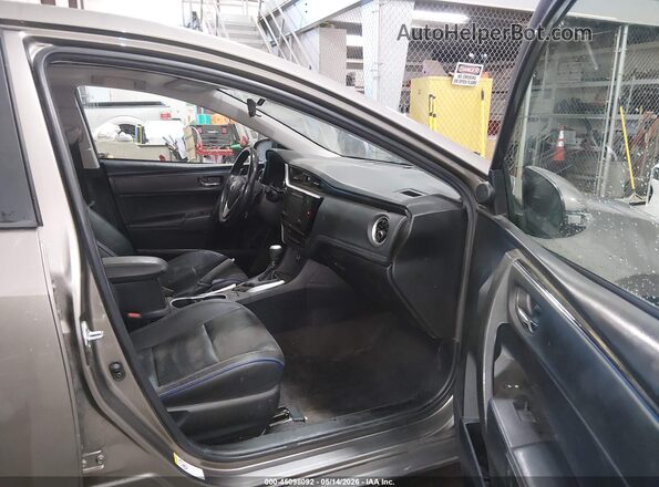 2T1BURHE7JC107426 2018 TOYOTA LL Gray წინა სალონის ხედი