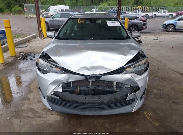 2T1BURHE8HC805201 2017 TOYOTA COROLLA Silver Սալոնի հետևի տեսք