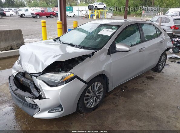 2T1BURHE8HC805201 2017 TOYOTA COROLLA Silver Առջևի ձախ երեք քառորդ տեսարան