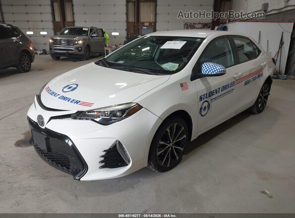 2T1BURHE8JC035829 2018 TOYOTA COROLLA White Front left