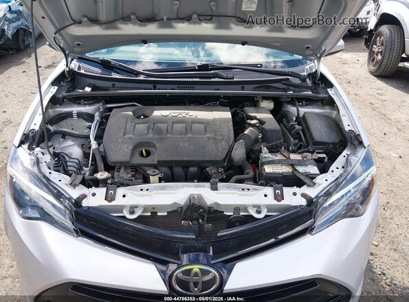 2T1BURHE8JC067275 2018 TOYOTA LL Серебряный Вид сзади