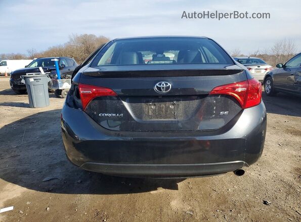 2T1BURHE8JC071018 2018 TOYOTA COROLLA Black 