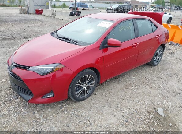 2T1BURHE8KC219525 2019 TOYOTA COROLLA Red Առջևի ձախ երեք քառորդ տեսարան