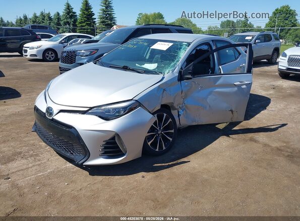 2T1BURHEXHC867084 2017 TOYOTA COROLLA Silver Vista tres cuartos delantera izquierda