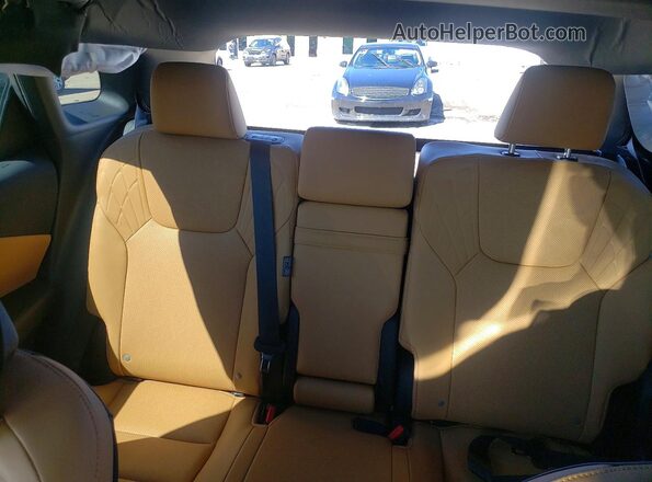 2T2BAMCA8SC123938 2025 LEXUS RX Green Vista de los asientos traseros