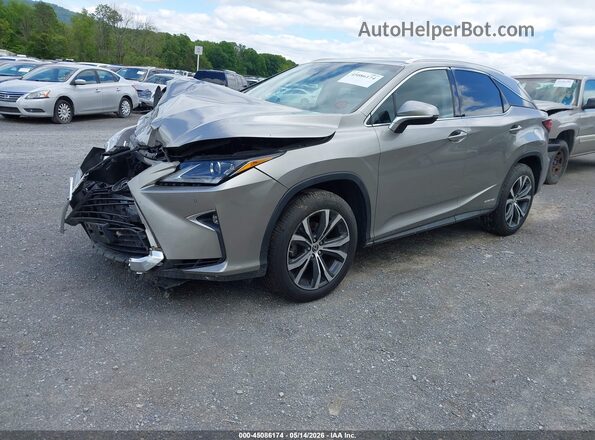 2T2BGMCA2KC030976 2019 LEXUS RX 450H Silver Vista tres cuartos delantera izquierda