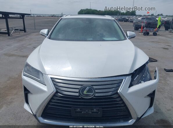 2T2BZMCA4KC195082 2019 LEXUS RX 350 White ხელსაწყოთა პანელის ხედი