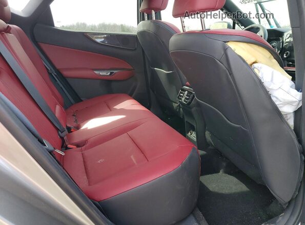 2T2GGCEZ6RC038740 2024 LEXUS NX Beige Widok wnętrza z tyłu