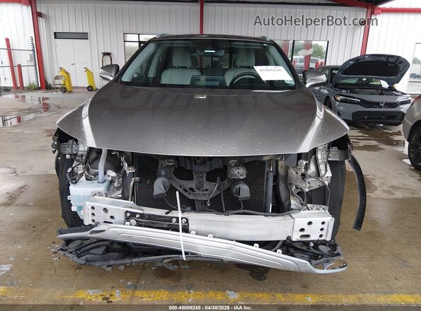 2T2HZMAA8LC168059 2020 LEXUS RX 350 Champagne Rear interior view