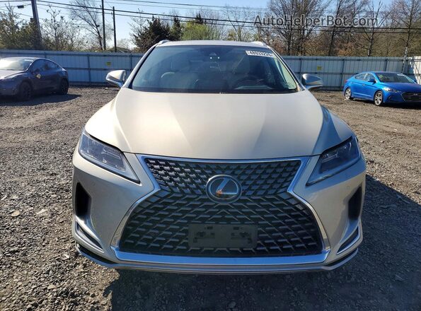 2T2HZMDA4MC270312 2021 LEXUS RX Cream 