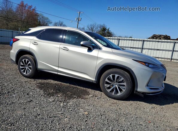 2T2HZMDA4MC270312 2021 LEXUS RX Cream 