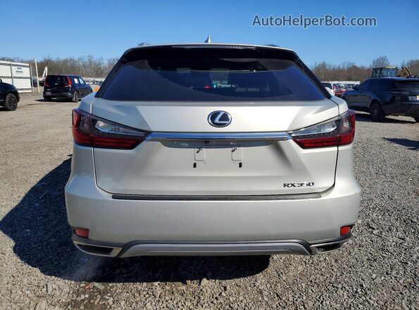 2T2HZMDA4MC270312 2021 LEXUS RX Cream 