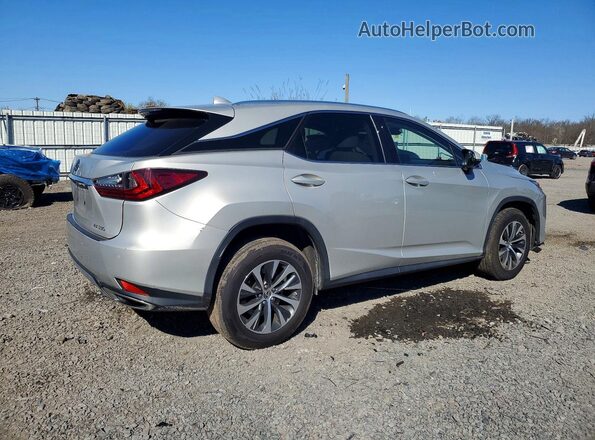 2T2HZMDA4MC270312 2021 LEXUS RX Cream 