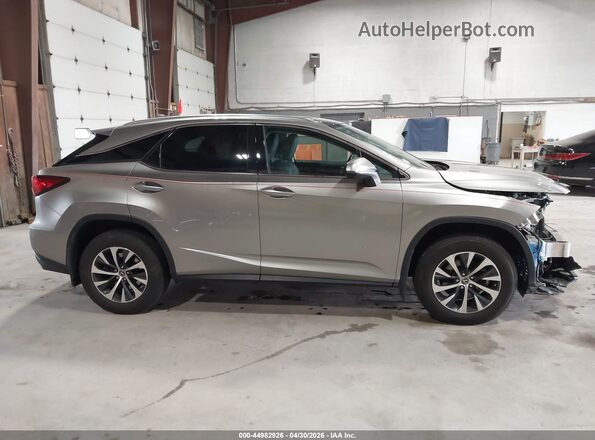 2T2HZMDA4NC324337 2022 LEXUS RX 350 Pewter Vista interior trasera