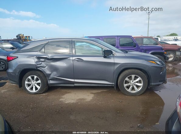 2T2ZZMCA4HC087049 2017 LEXUS RX 350 Gray Widok wnętrza z tyłu
