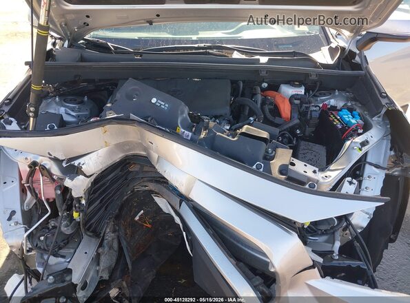 2T3B6RFV1RW059663 2024 TOYOTA RAV4 HYBRID Silver Вид ззаду