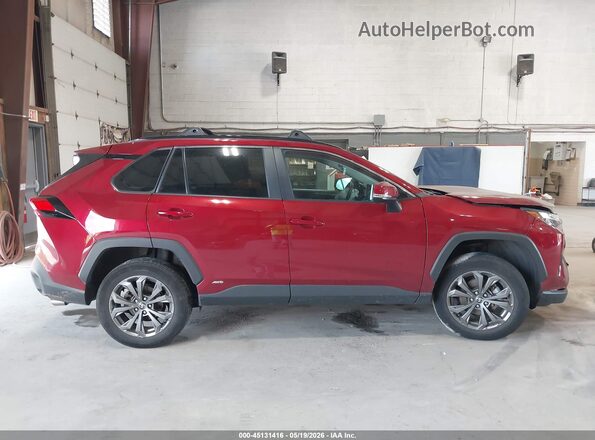 2T3B6RFV5RW066695 2024 TOYOTA RAV4 HYBRID Red Widok wnętrza z tyłu