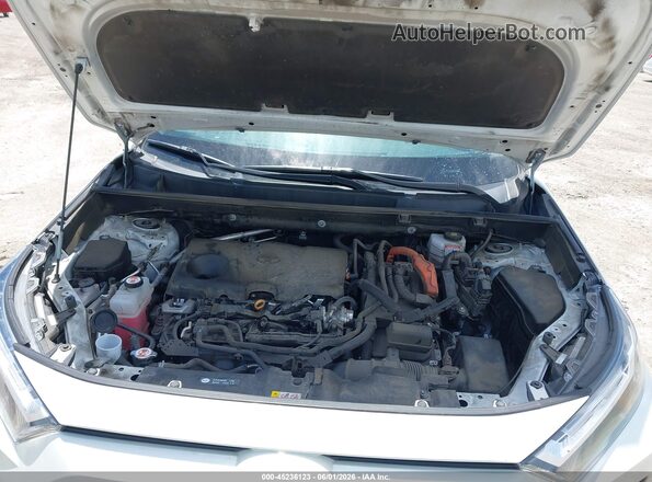 2T3B6RFVXNW037669 2022 TOYOTA RAV4 HYBRID White Rear view